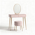 Pink vanity set with round mirror and padded stool for bedroom use